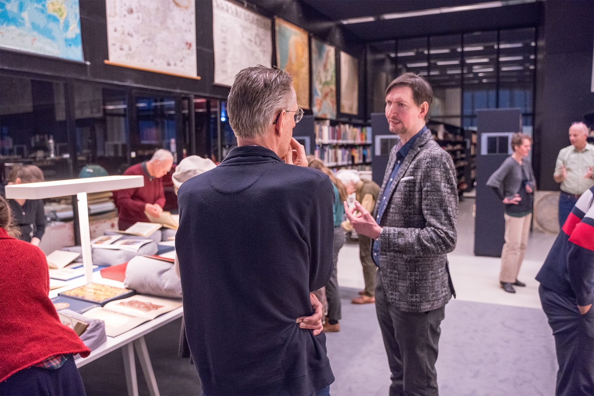 Christian Ziereis in conversation with Dr. Bart Jaski in the Map Room of the Utrecht University Library, where an exhibition was curated for this occasion Christian Ziereis in conversation with Dr. Bart Jaski in the Map Room of the Utrecht University Library, where an exhibition was curated for this occasion
