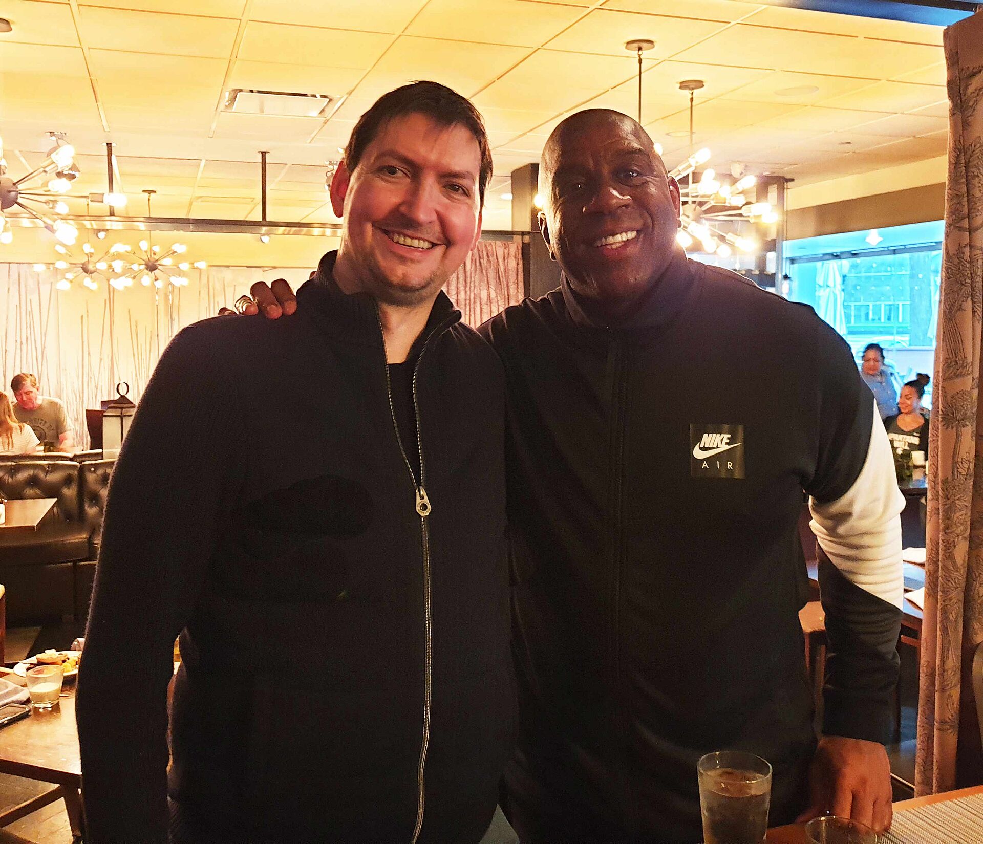Christian Ziereis and Earvin "Magic" Johnson