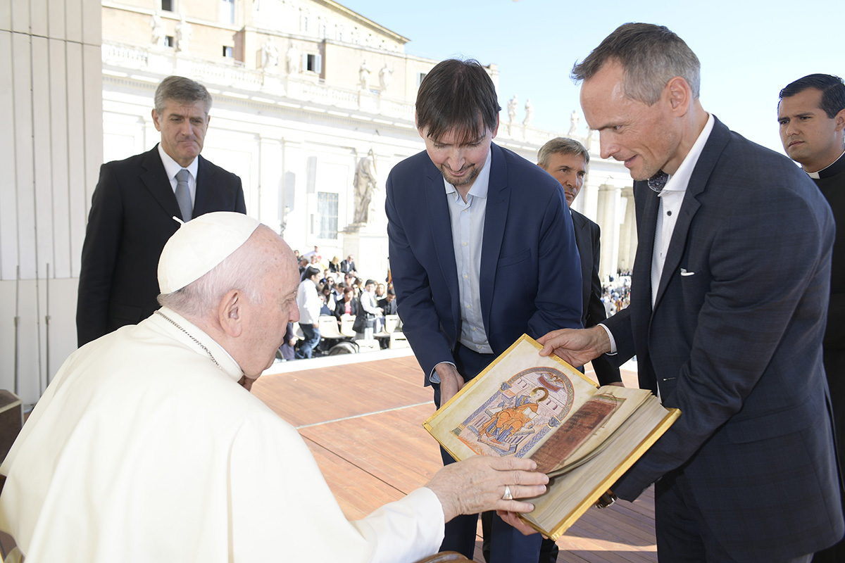 Pope Francis is particularly fascinated by the full-page miniatures in the Ottonian style. Photo (c) Vatican Media